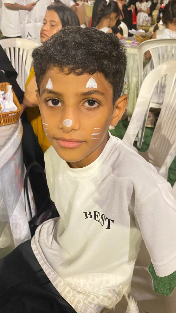 11911-576x1024 فرحة يتيم وسعادته.. لا تُقدّر بثمن